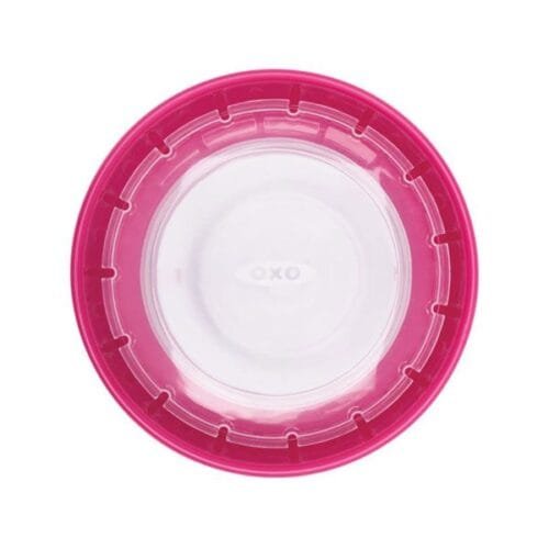 Vaso de aprendizaje marca Oxo de color rosa