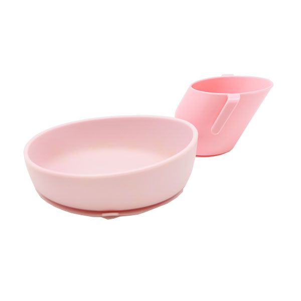 Plato y taza de la marca Doidy de color rosa